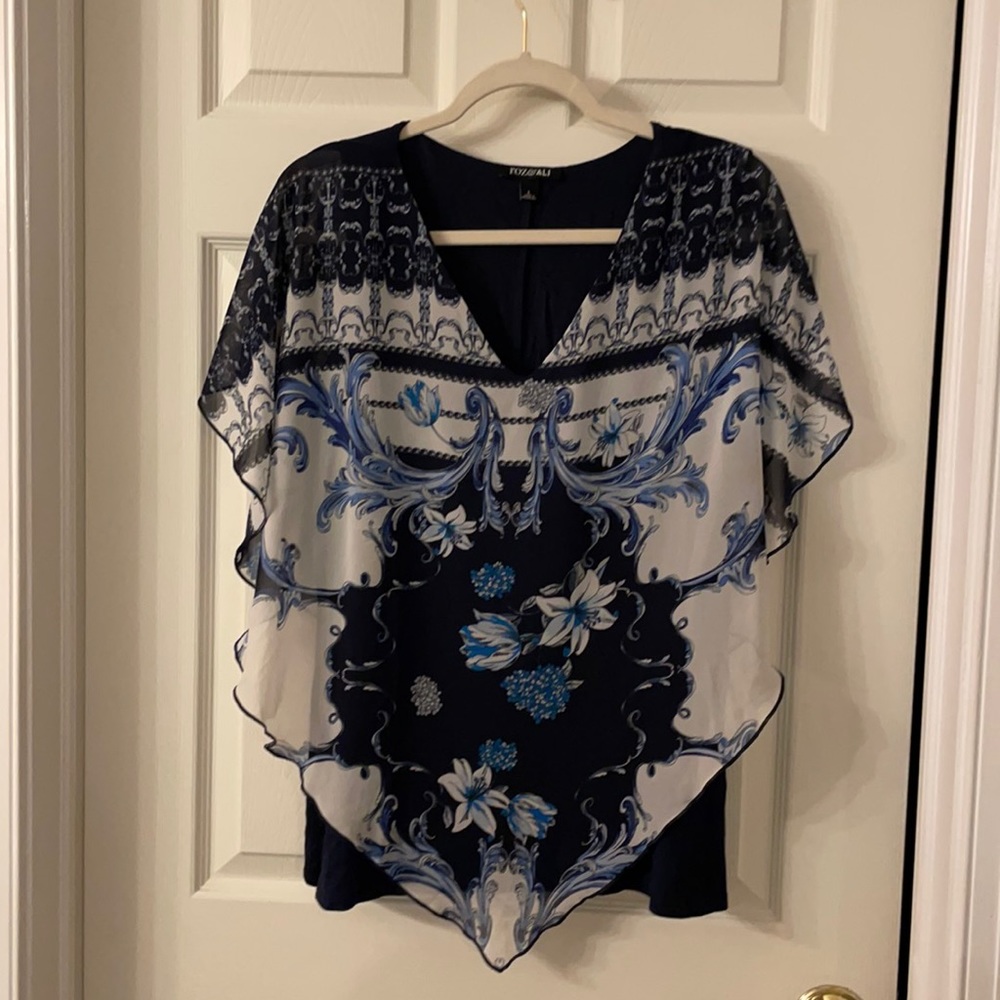 Cute top never worn.